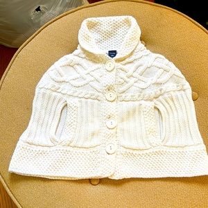 Beautiful toddler girl’s cape/sweater.